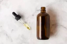 flat lay bottle oils with pipette flat lay bottle oils with pipette