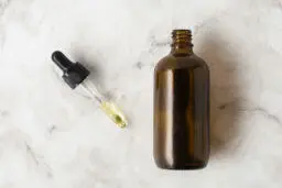 flat lay bottle oils with pipette flat lay bottle oils with pipette